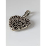 Silver steed filigree heart silver pendant featuring a handmade silver filigree locket with polished finish