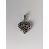 Silver steed filigree heart silver pendant featuring a handmade silver filigree design on a heart-shaped pendant