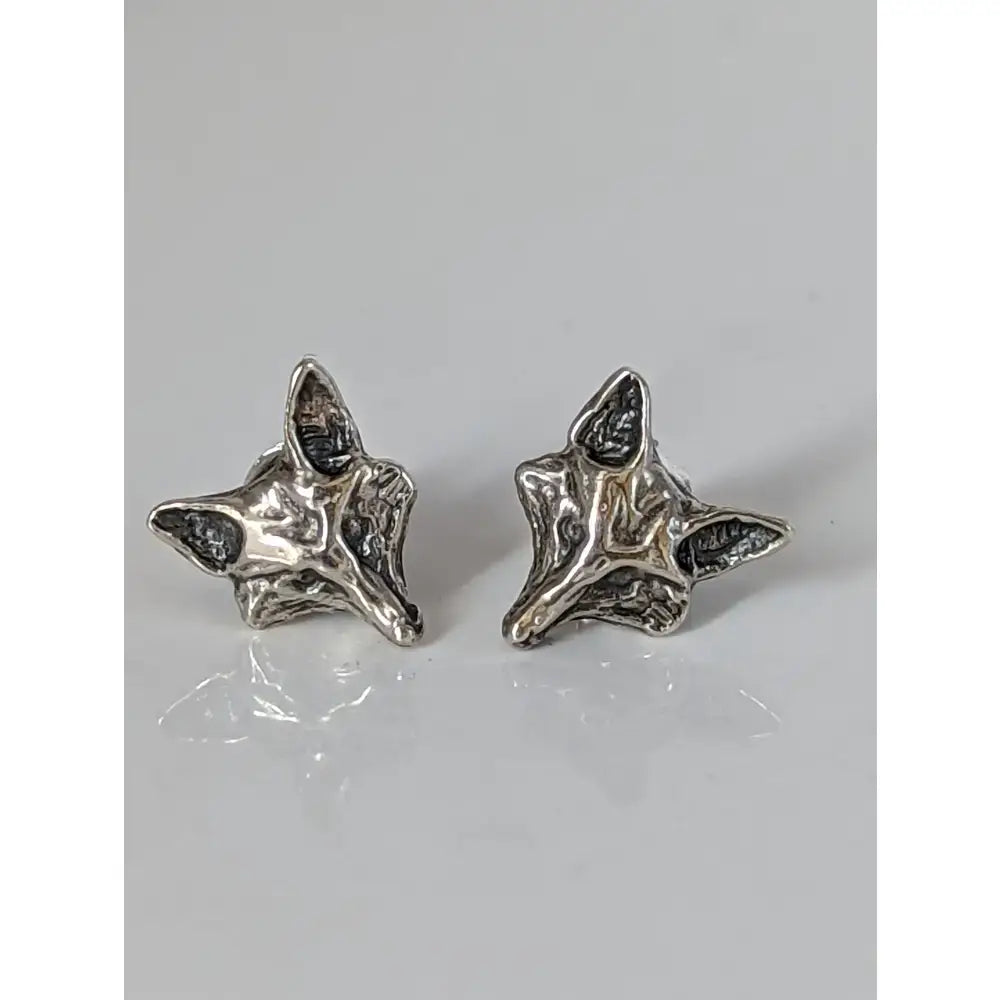 Silver steed fox head stud earrings with textured handcrafted detailing in shiny silver fox head stud design