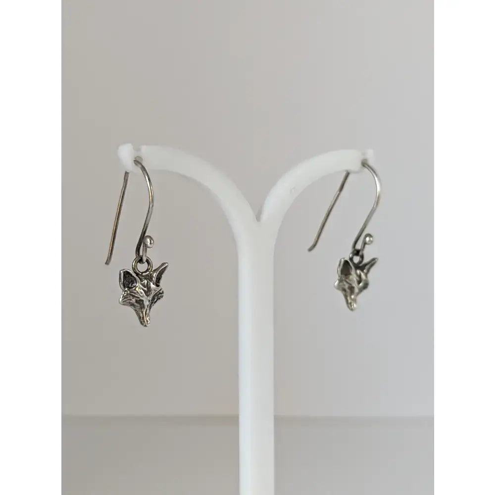 Silver steed fox long dropped earrings featuring silver fox head design with intricate detailing and polished finish