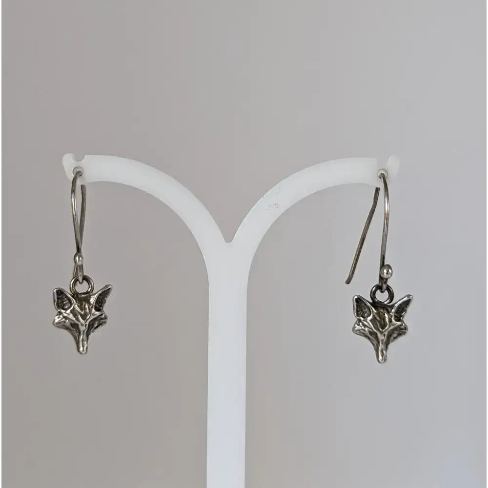 Silver steed fox long dropped earrings featuring detailed silver fox heads with a polished metallic finish from fox collection