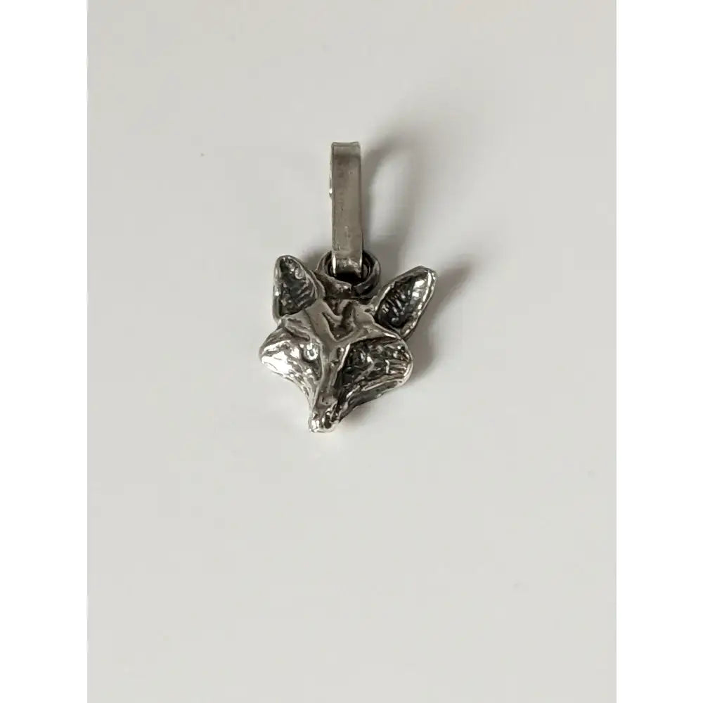 Silver steed fox silver pendant featuring a detailed silver fox head with textured surface on a polished chain