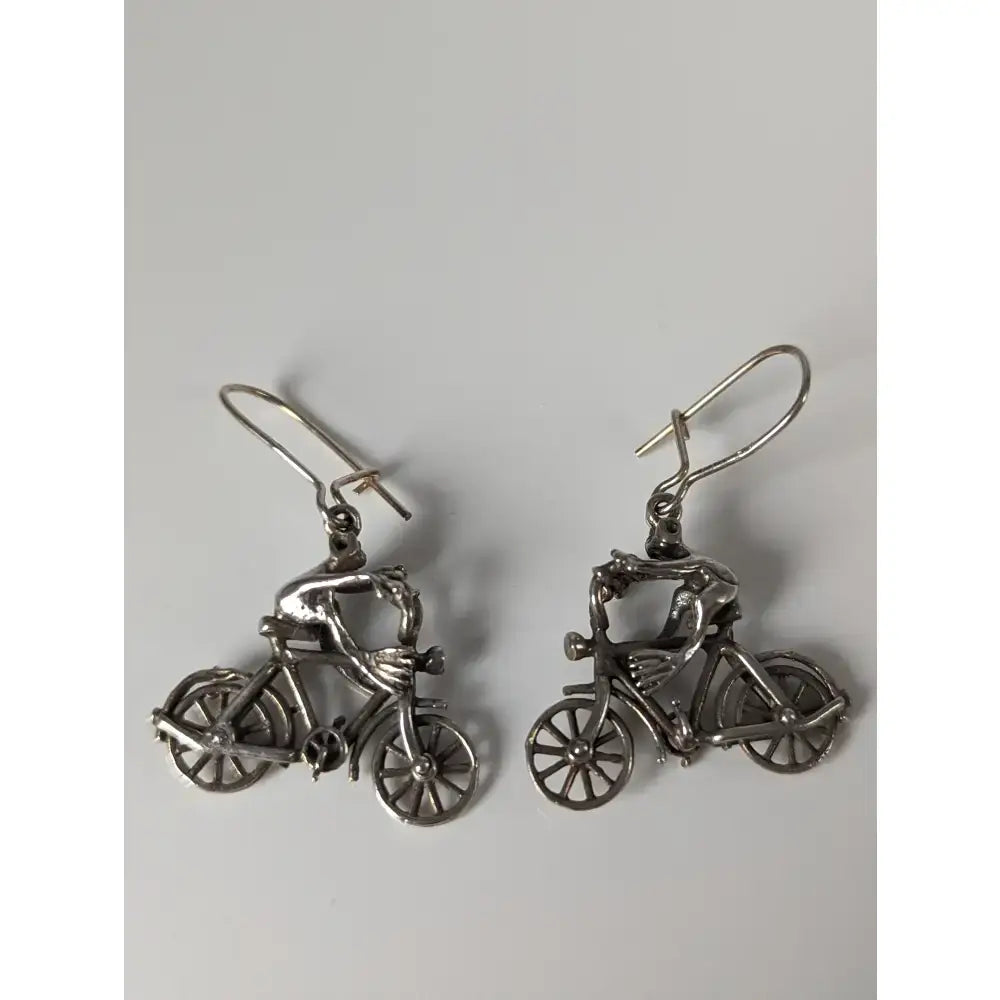 Silver steed frogs silver earrings with detailed riders on classic bikes in polished sterling silver bikes dropped earrings