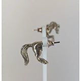 Silver steed horse studs earrings featuring front and hind horse designs with detailed mane and tail in metallic finish
