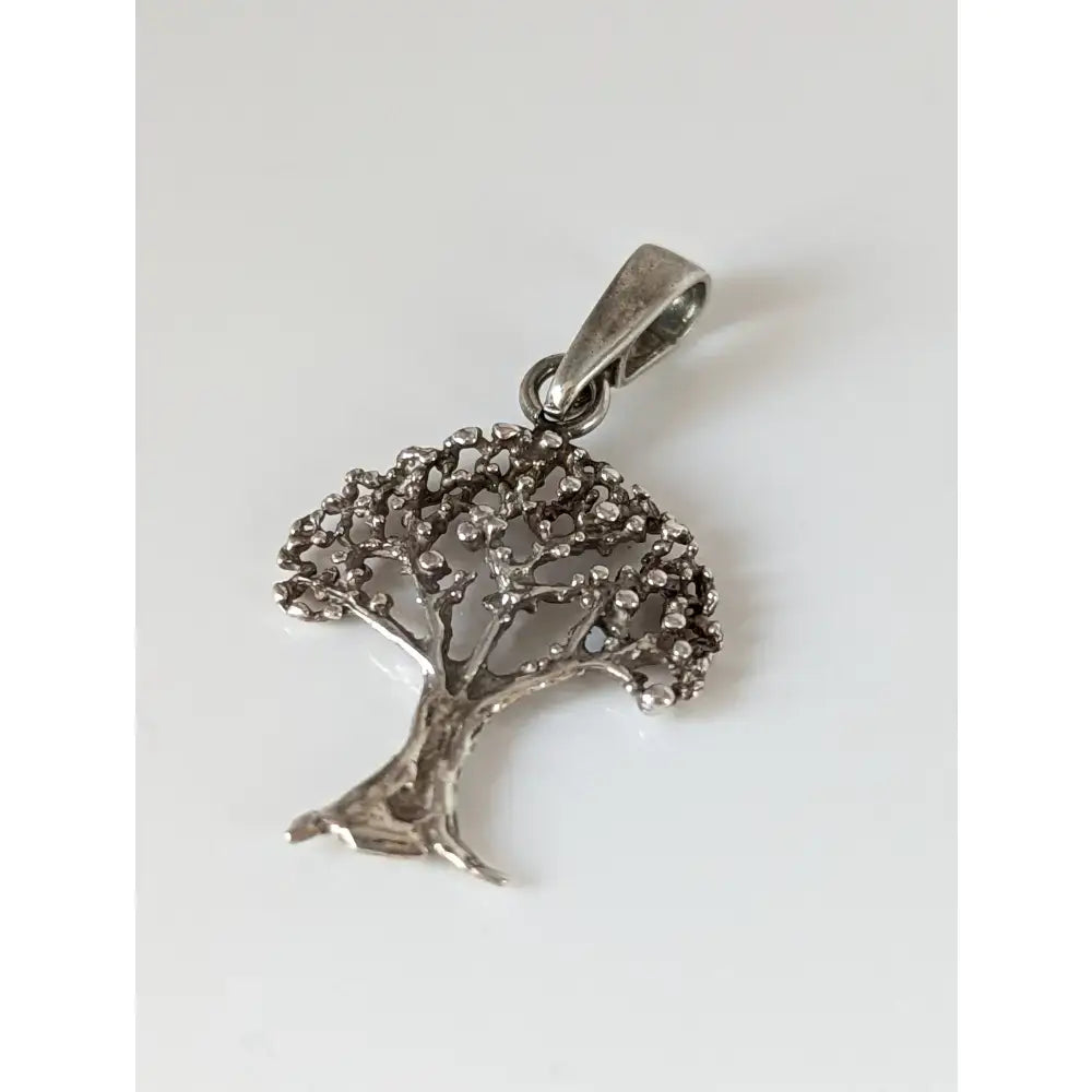 Silver steed fruit tree silver pendant with intricate filigree design and clear stones in sterling silver