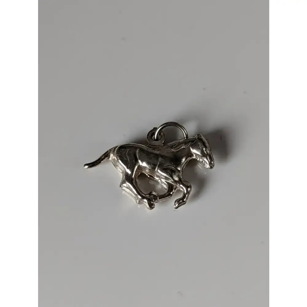 Silver steed galloping horse silver pendant featuring a detailed silver pendant with polished metallic finish