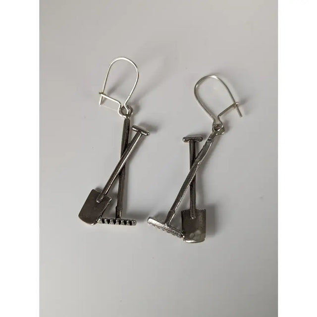 Silver steed gardening tools dropped earrings in silver-toned metal with minimalist shovel and rake design