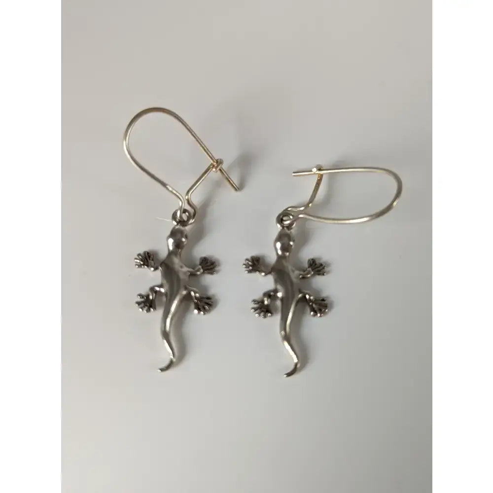 Silver steed gecko silver dropped earrings featuring a unique gecko design with detailed claws and tails