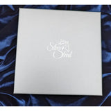 Silver steed gift boxes featuring a silver branded gift box with subtle embossed logo and elegant white cursive script