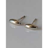 Silver steed grain bud stud earrings with smooth polished finish handmade silver by skilled artisans