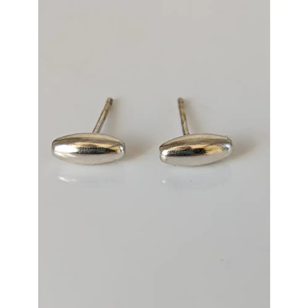 Silver steed grain bud stud earrings with smooth polished finish handmade silver by skilled artisans
