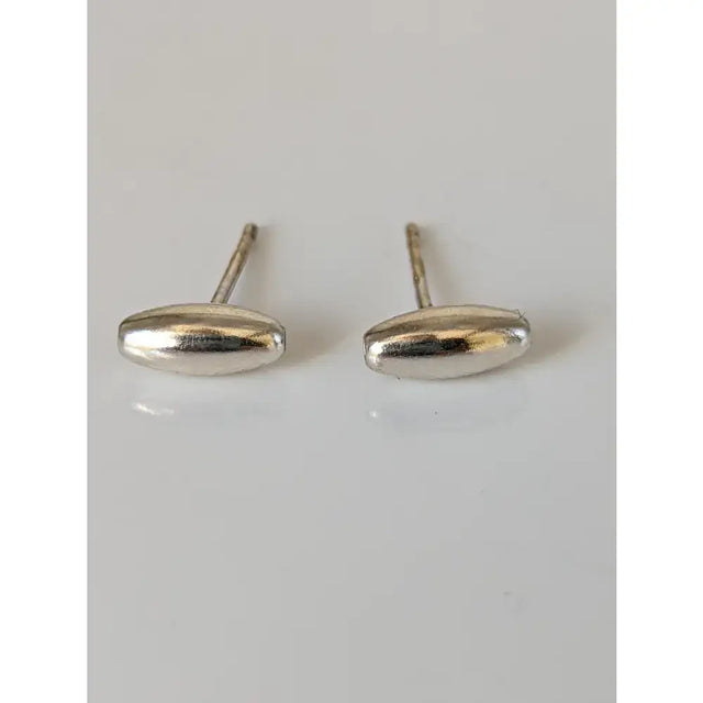 Silver steed grain bud stud earrings with smooth polished finish handmade silver by skilled artisans