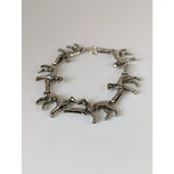 Silver steed greyhound silver bracelet crafted with linked silver-toned horse figurines in a running pose