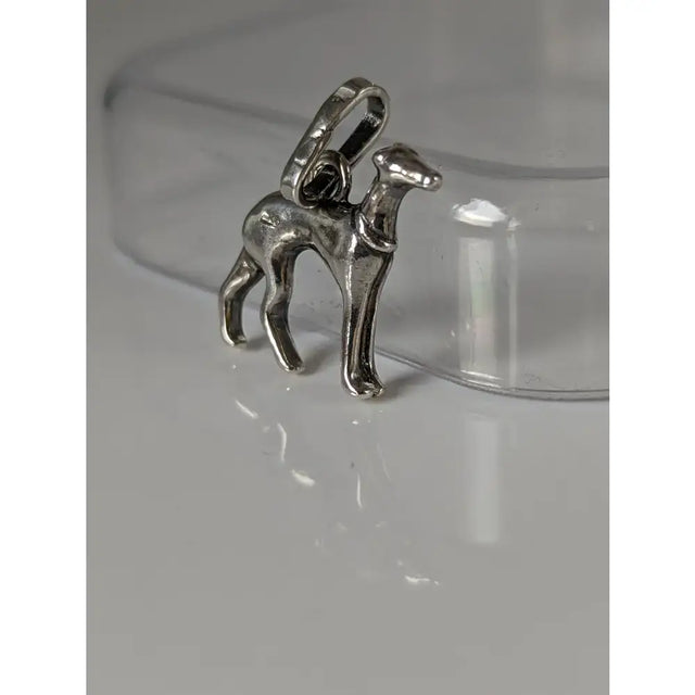 Silver steed greyhound silver pendant is a polished silver dog charm with loop perfect for equestrian lovers