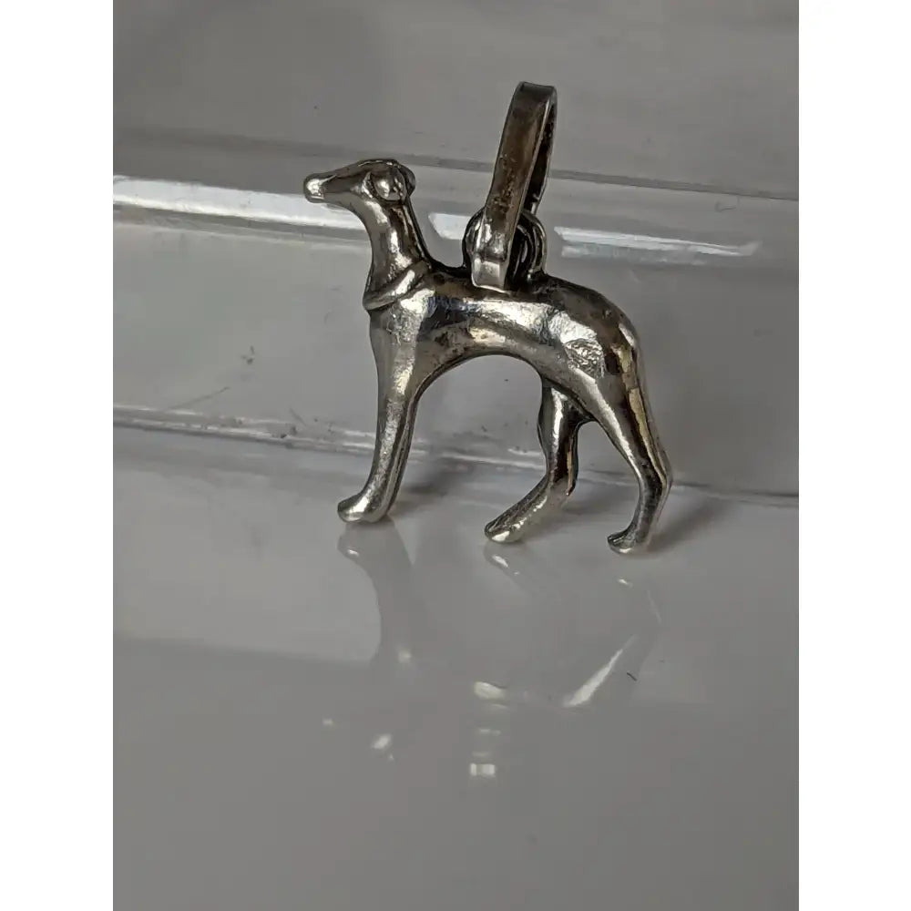 Silver steed greyhound silver pendant is a finely crafted equestrian greyhound silver pendant with a polished finish and loop