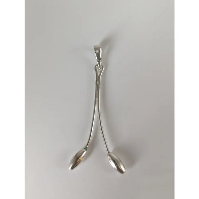 Silver steed hanging silver pendant with two slender spoon-shaped charms in polished silver stem silver pendant style