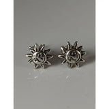 Silver steed happy sun stud earrings featuring silver sun stud earrings with a smiling face and radiating rays