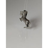 Silver steed haute ecole pendant featuring a detailed silver horse with polished metallic finish equestrian pendant
