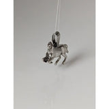 Silver steed haute ecole pendant featuring a polished silver horse with detailed sculpted features perfect as an equestrian pendant