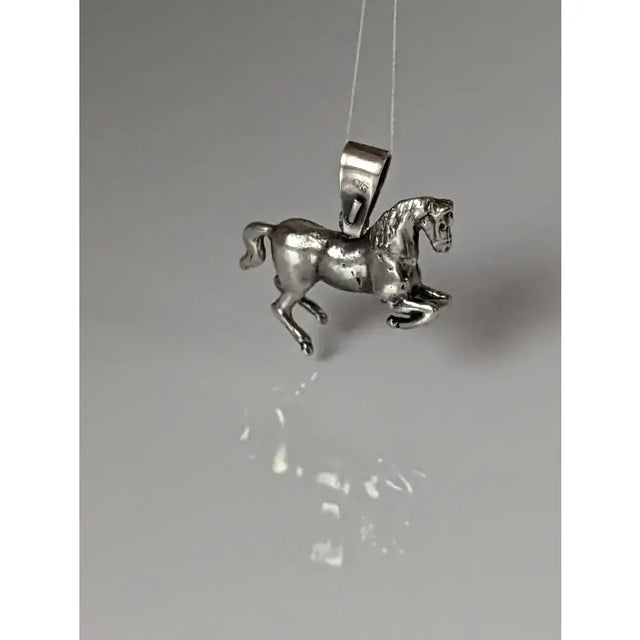 Silver steed haute ecole pendant featuring a detailed sculpted silver horse with a polished metallic finish equestrian pendant