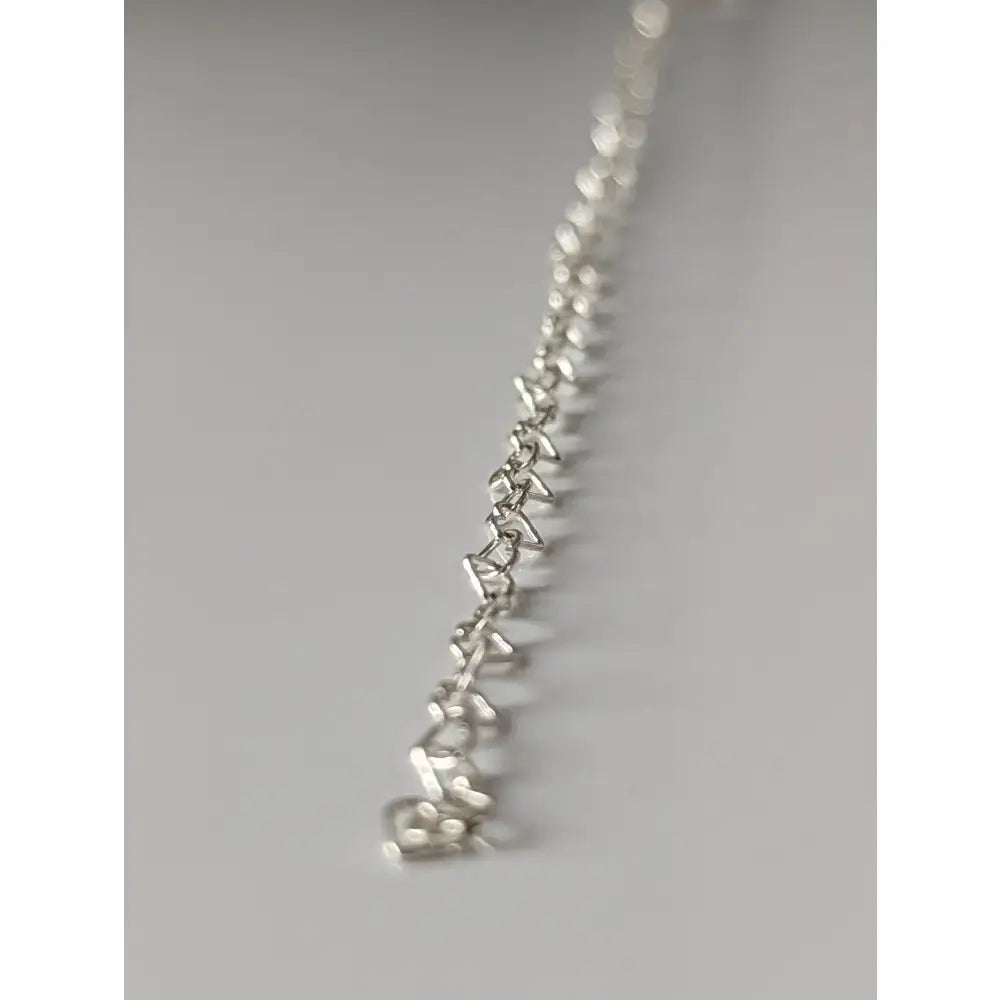 Silver steed heart link silver bracelet with interlocking slightly irregular links in shiny silver chain design