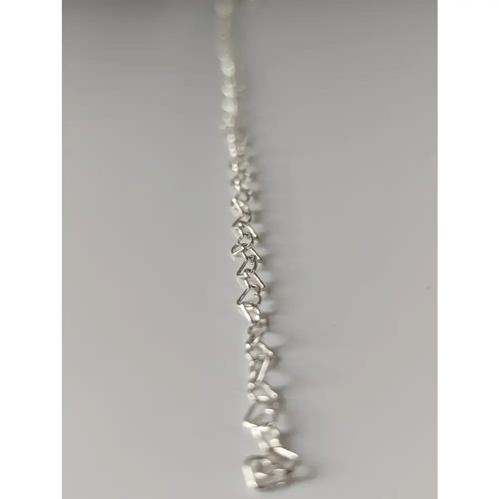 Silver steed heart link silver bracelet featuring a link silver bracelet with interlocking heart-shaped links in silver