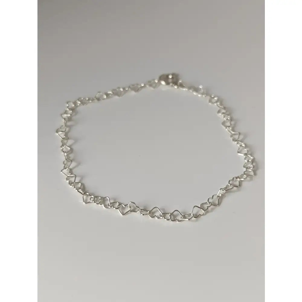 Silver steed heart link silver bracelet with a silver heart shaped chain anklet and a simple clasp design