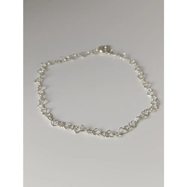 Silver steed heart link silver bracelet with a silver heart shaped chain anklet and a simple clasp design