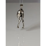 Silver steed hindquarters sterling silver pendant with detailed sculpted legs and tail hanging from simple metal bail