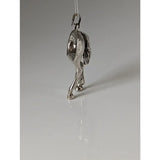 Silver steed hindquarters sterling silver pendant shaped like a horse with detailed mane and legs hanging from a loop