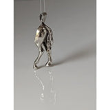 Silver steed hindquarters sterling silver pendant with detailed sculpted legs and tail hanging from a simple loop