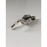 Silver steed hindquarters sterling silver pendant shaped like a textured pipe with two clear gemstones