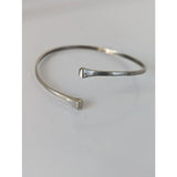 Silver steed hoofnail hammered sterling silver cuff bangle with open minimalist design and subtle engravings