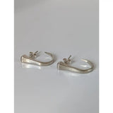 Silver steed hoofnail stud earrings silver hoop with hammered texture and subtle engraved details