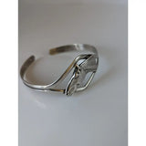 Silver steed horse head bangle with a sleek open design and polished silver finish perfect for everyday wear