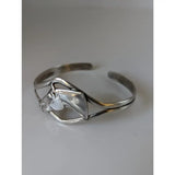 Silver steed horse head bangle silver-toned cuff with intricate sculptural design and oxidized finish featuring bat motif