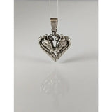 Silver steed horse heart pendant with two detailed silver wolf faces in a polished metal horse heart pendant