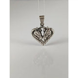 Silver steed horse heart pendant with polished silver horse heads facing each other in a detailed design