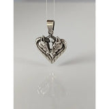 Silver steed horse heart pendant with polished silver metal and detailed horse heads facing each other