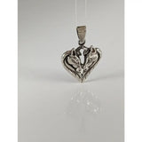 Silver steed horse heart pendant with two detailed horse heads in polished silver metal heart-shaped design