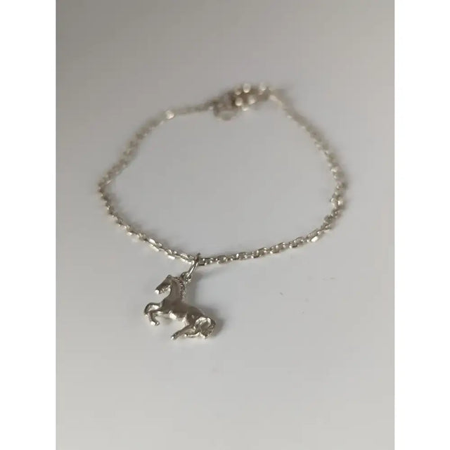 Silver steed horse chain delicate bracelet featuring a detailed horse charm with a polished sterling silver finish