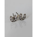 Silver steed horse shoe zirconia stud earrings featuring silver horseshoe-shaped studs with clear crystals