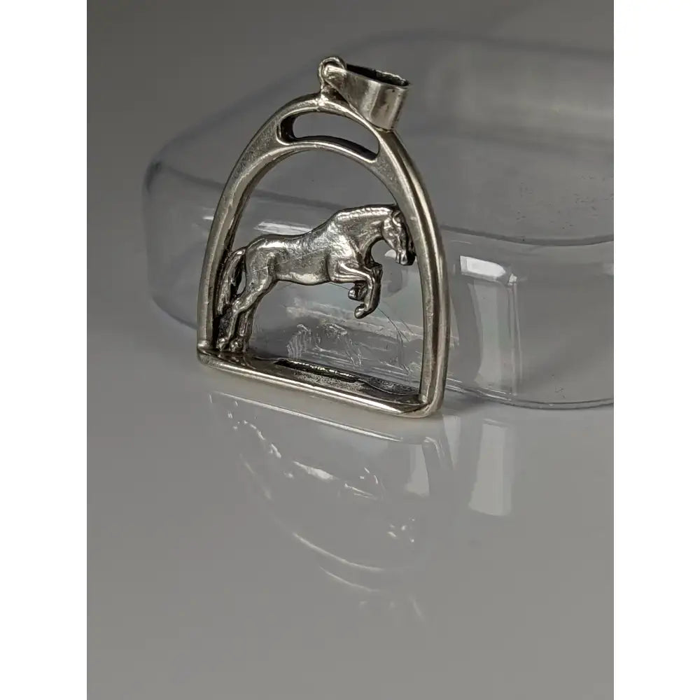 Silver steed horse stirrup silver pendant with detailed galloping horse figure on high-polished chain