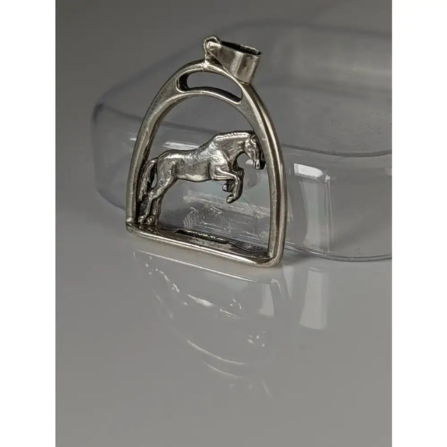 Silver steed horse stirrup silver pendant with detailed galloping horse figure on high-polished chain