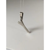 Silver steed horseshoe nail silver pendant featuring a polished silver-colored metal nail with engraved markings