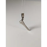 Silver steed silver pendant shaped like a polished horseshoe nail with a loop for hanging