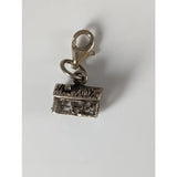 Silver steed house silver charm is a silver charm shaped like a miniature house with textured roof and lobster clasp for equestrian jewelry