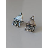 Silver steed house stud earrings featuring textured roofs and detailed windows perfect for horse lovers
