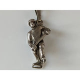Silver steed ice hockey silver pendant showing a silver firefighter on ice skates holding an axe for sports fans