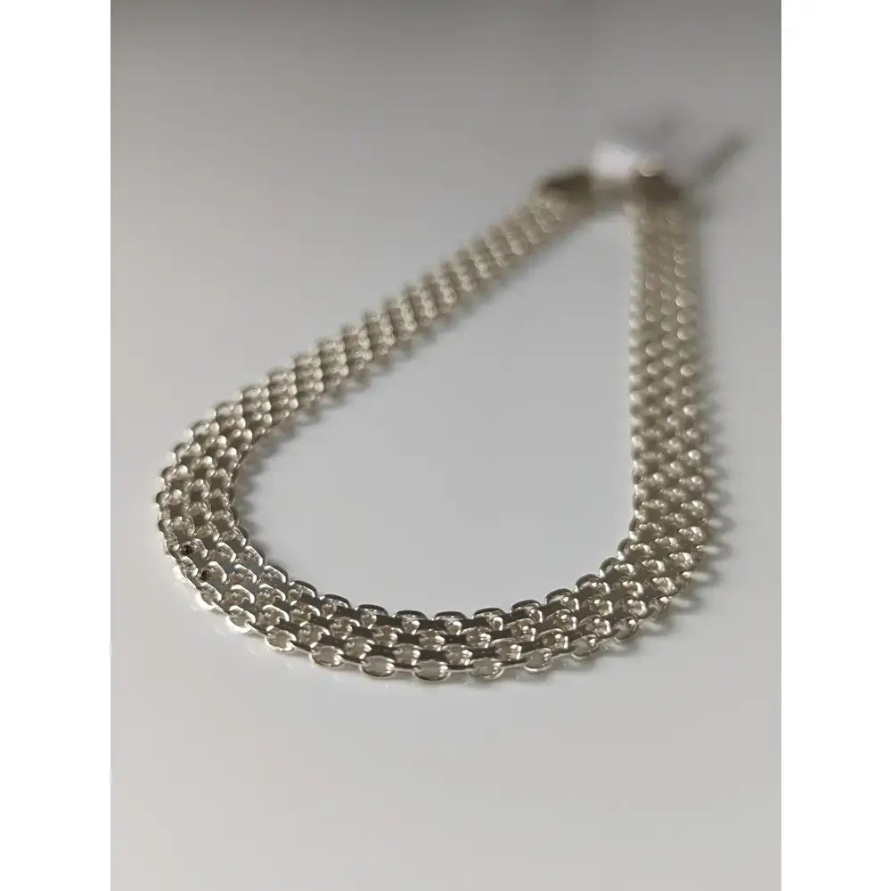 Silver steed interlink silver bracelet with polished silver-toned multi-strand interlink chain design